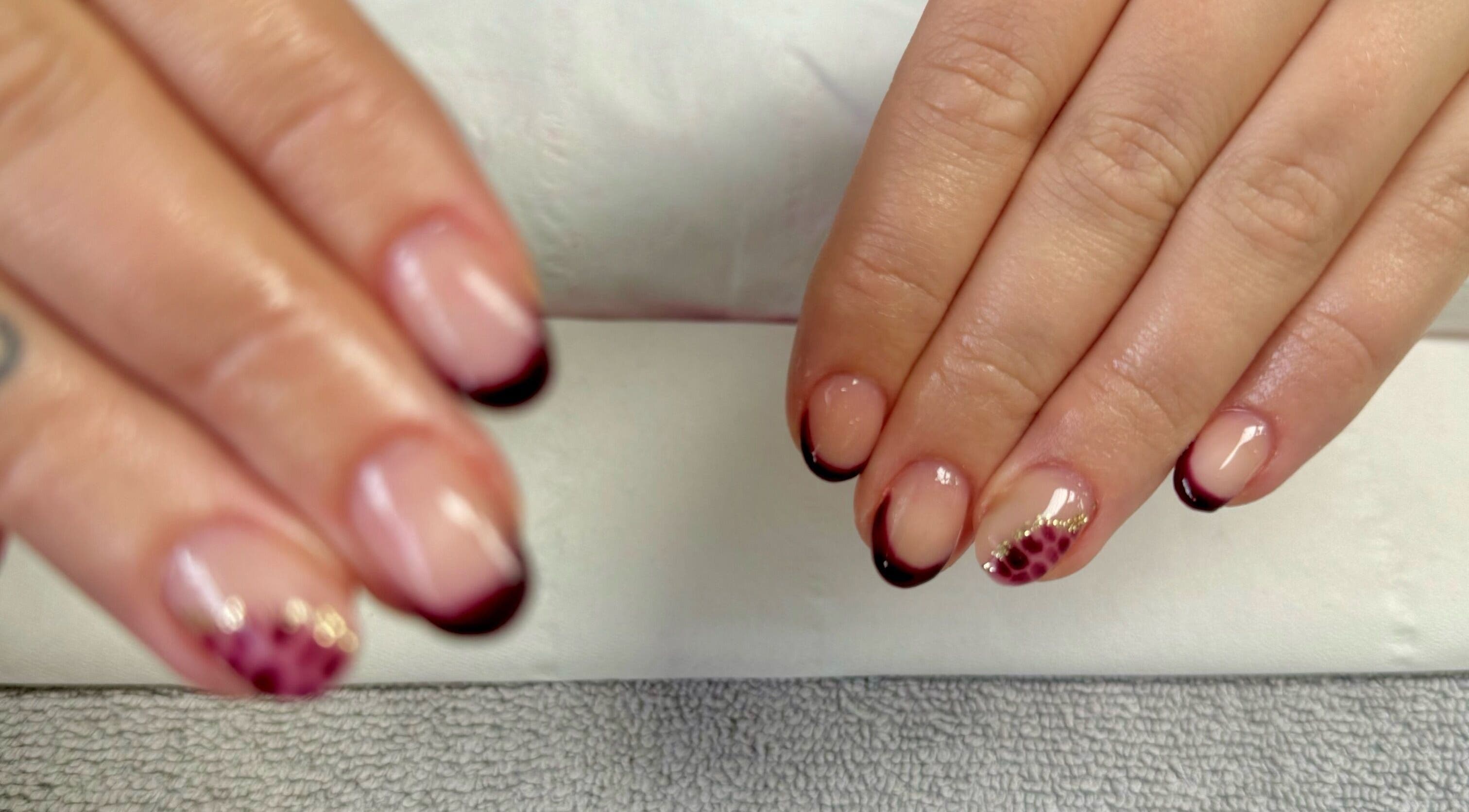 Stylish nail design with dark tips at Bree Taylorr, Weymouth, England, GB, showcasing elegance.