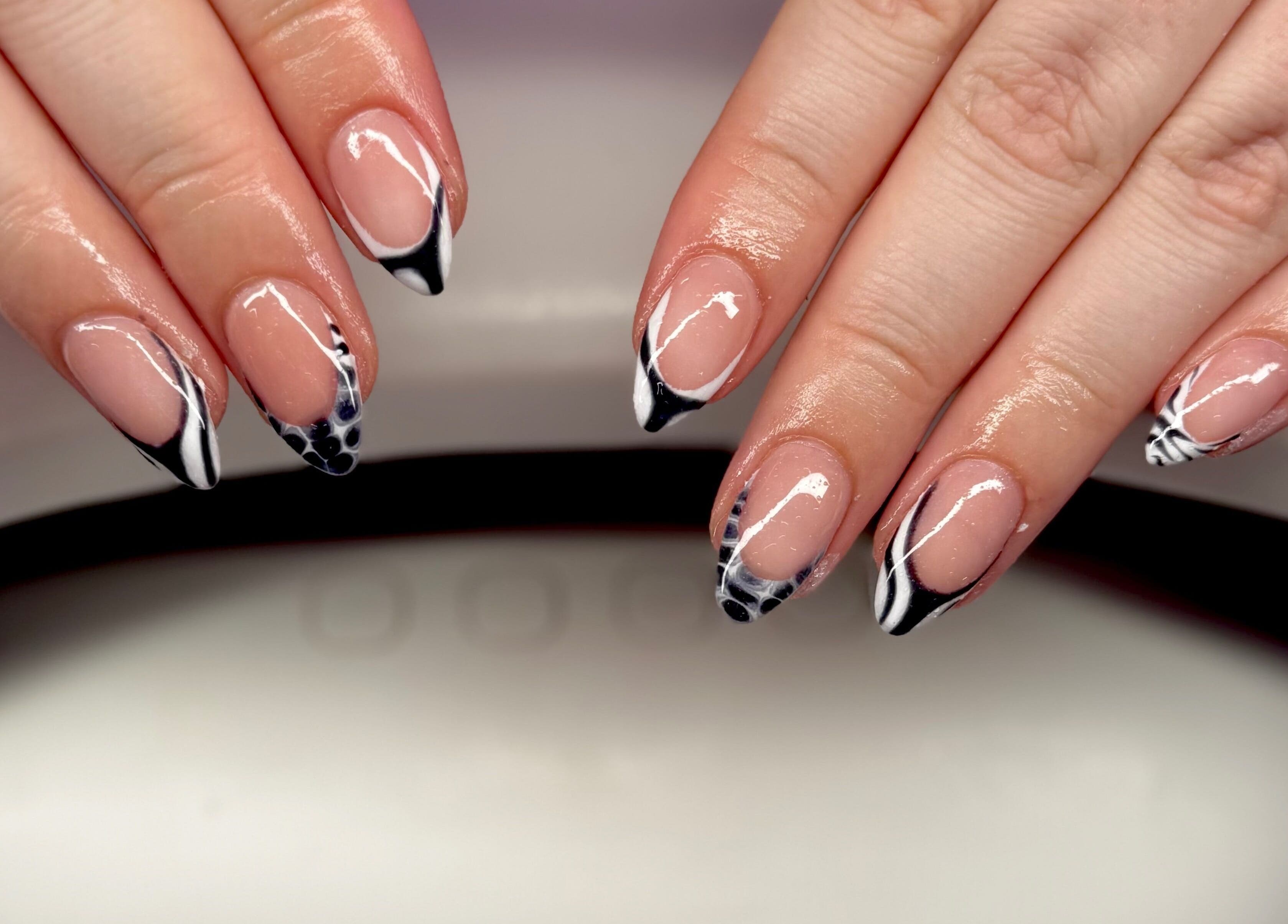 Stylish black and white nail art at Bree Taylorr, Weymouth, England, GB. Perfect for a modern look.