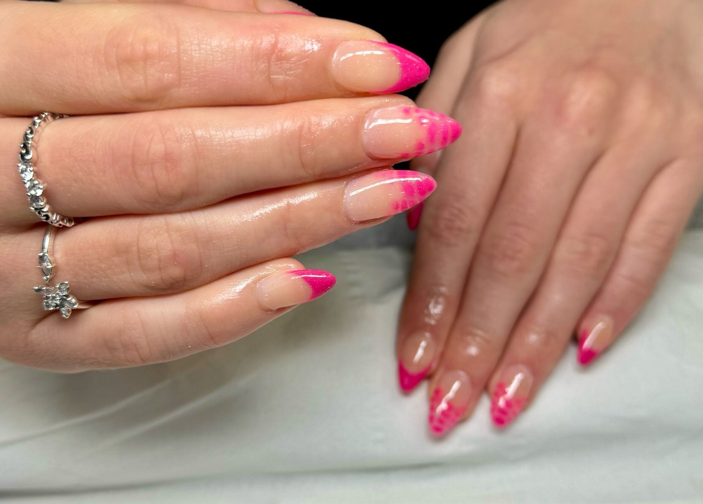Elegant pink nails at Bree Taylorr, Weymouth, England, GB showcasing vibrant nail art design.