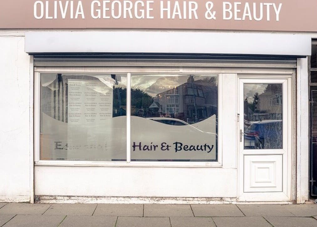 Front view of Opal Ink & Laser in Whiston, England, GB, showcasing its inviting shopfront.