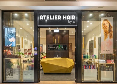 Front view of Atelier Hair by C in West Ryde, New South Wales, AU showcasing modern design and hair products.