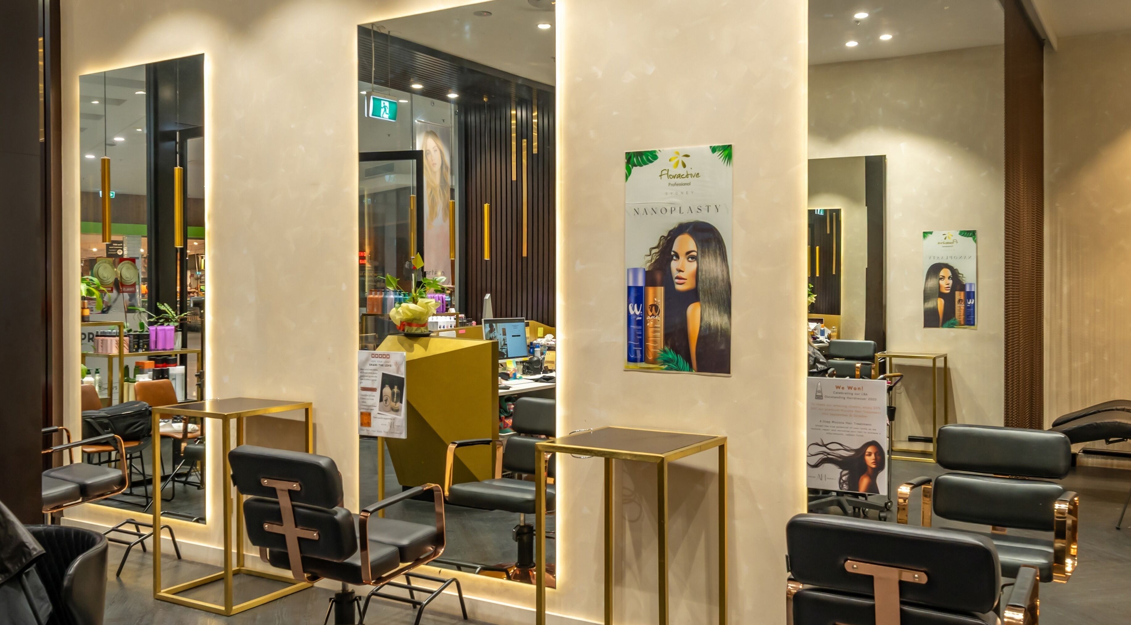 Chic interior of Atelier Hair by C, West Ryde, New South Wales, AU featuring sleek salon chairs and mirrors.