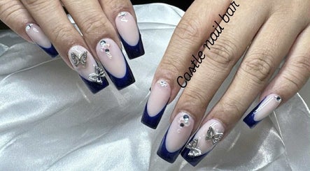 Stylish blue and silver nail art at Castle Nail Bar, Edwardstown, South Australia, AU.