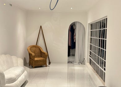 Elegant lounge with chair and sofa at Morganite Photography, Alberton, Gauteng, ZA.