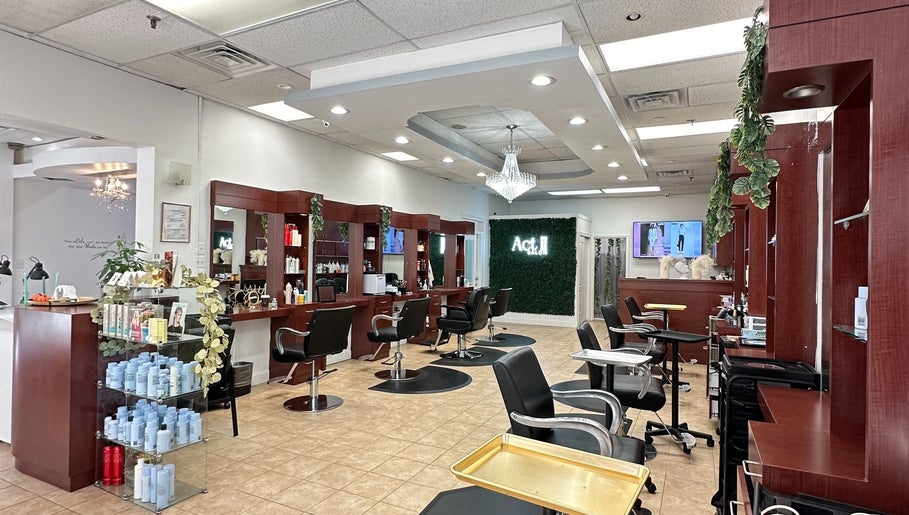Elegant interior of Act II Salon in Fairfax, Virginia, US, showcasing stylish chairs and modern decor.