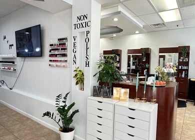 Modern interior of Act II Salon in Fairfax, Virginia, US, featuring non-toxic vegan polish and stylish decor.