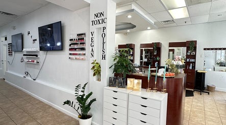 Modern interior of Act II Salon in Fairfax, Virginia, US, featuring non-toxic vegan polish and stylish decor.