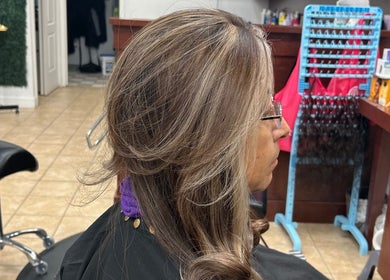 Elegant hair styling at Act II Salon in Fairfax, Virginia, US, showcasing professional salon ambiance and expertise.