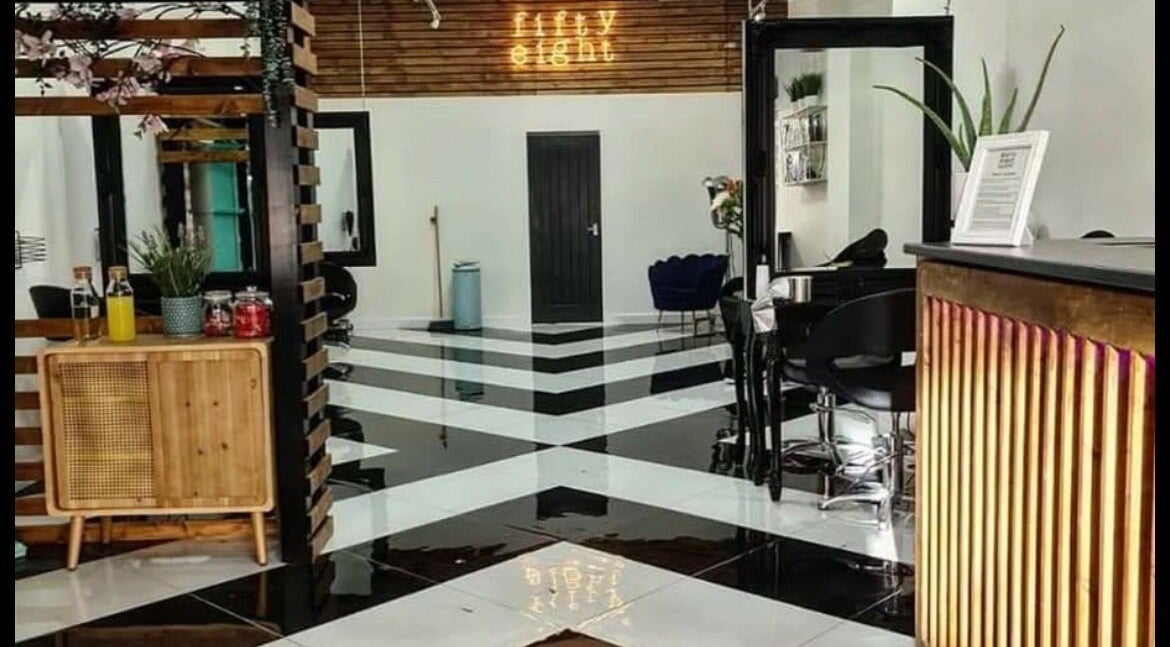 Stylish interior of Gemma Fifty Eight Hair Design in Gillingham, England, GB featuring modern decor and sleek design.