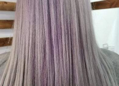 Lavender toned hair at Gemma Fifty Eight Hair Design in Gillingham, England, GB showcases vibrant color technique.