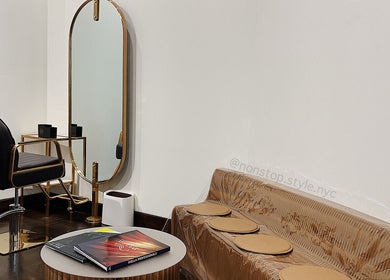 Elegant salon chair and mirror setup at Nonstop Style 11, New York, New York, US.
