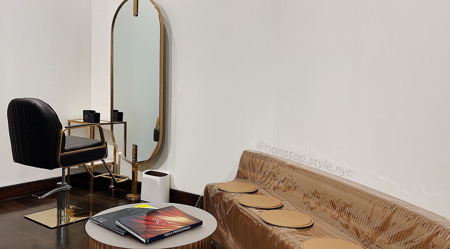 Elegant salon chair and mirror setup at Nonstop Style 11, New York, New York, US.