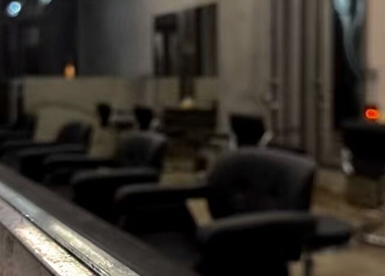 Modern salon chairs at Nonstop Style LIC, New York, New York, US, showcasing sleek design and comfort.