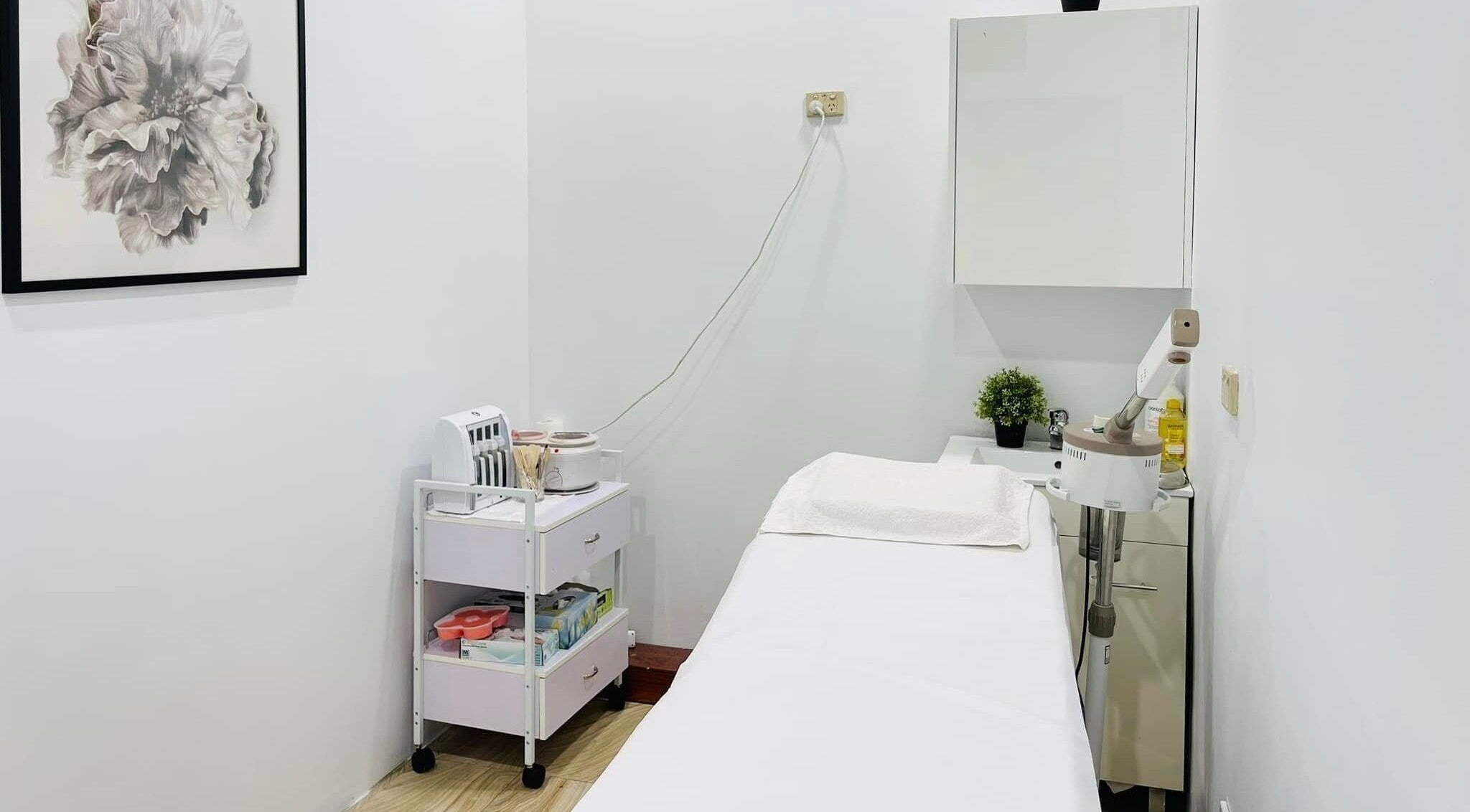 Relaxing treatment room at Ease’s Nail and Beauty Caringbah, Caringbah, New South Wales, AU. Minimalist decor enhances tranquility.