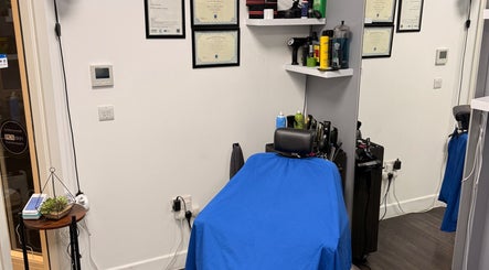 Barber chair and tools at José J&DBarbers Studio, Manchester, England, GB.