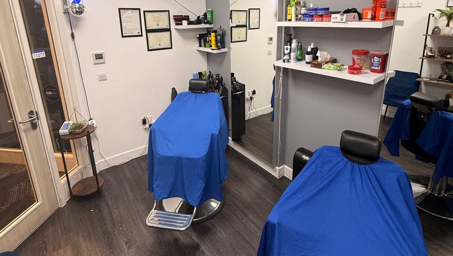 Chic interior of José J&DBarbers Studio in Manchester, England, GB with stylish grooming stations.