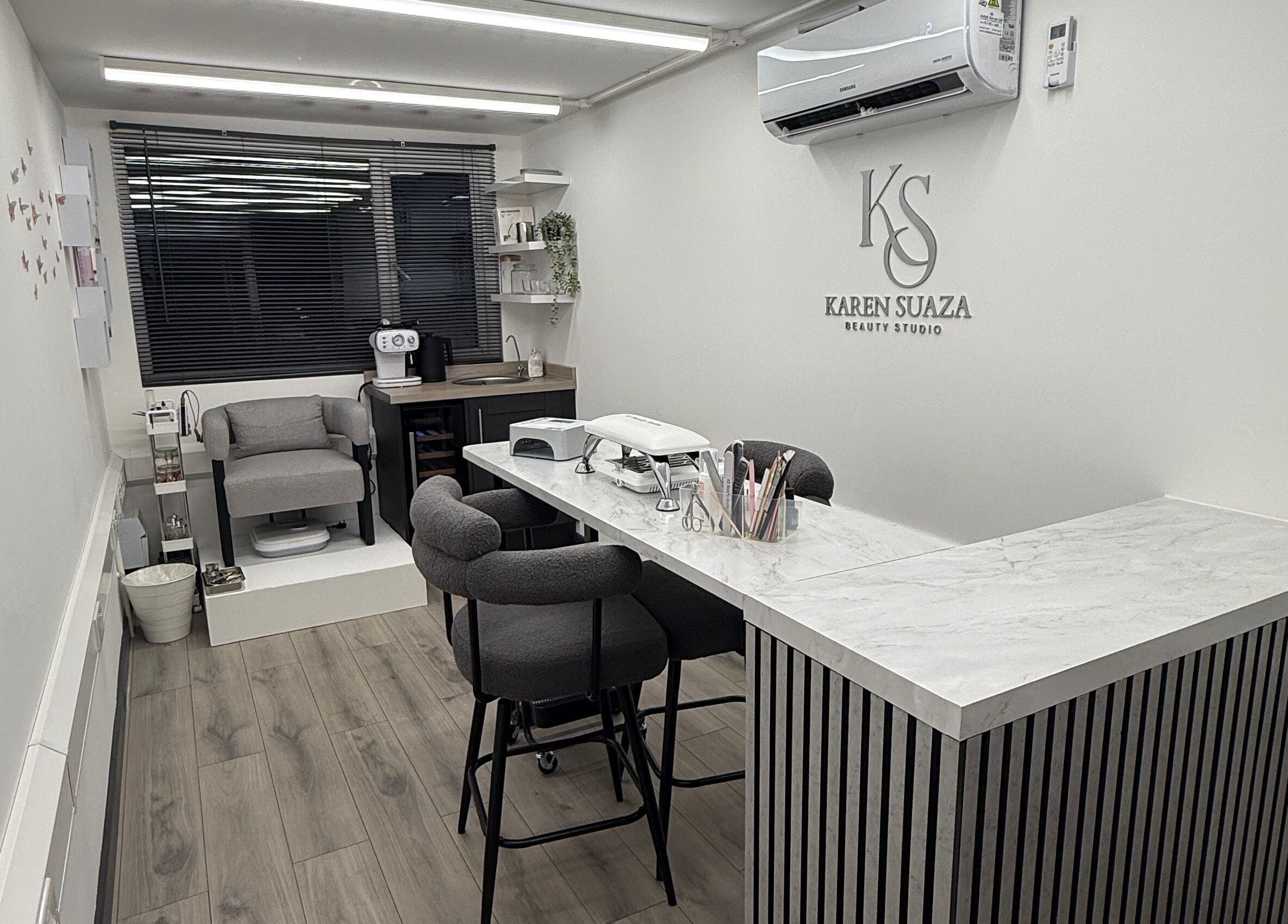 Modern interior of KS Karen Suaza Beauty Studio in Brookwood, England, GB showcasing sleek furniture and decor.