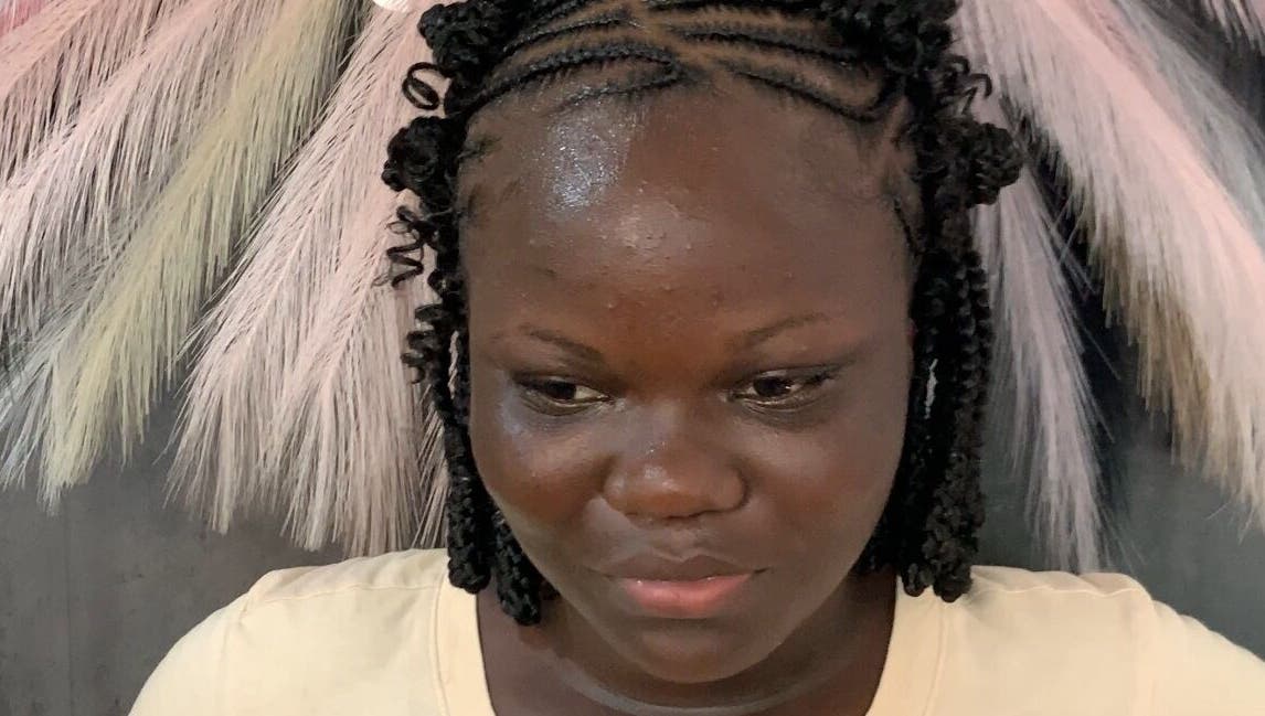 Intricate cornrow braids styled at Braided by Kie in Roseau, DM, showcasing professional hair artistry.