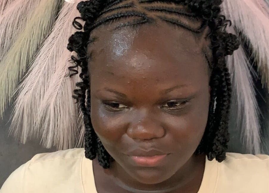 Intricate cornrow braids styled at Braided by Kie in Roseau, DM, showcasing professional hair artistry.