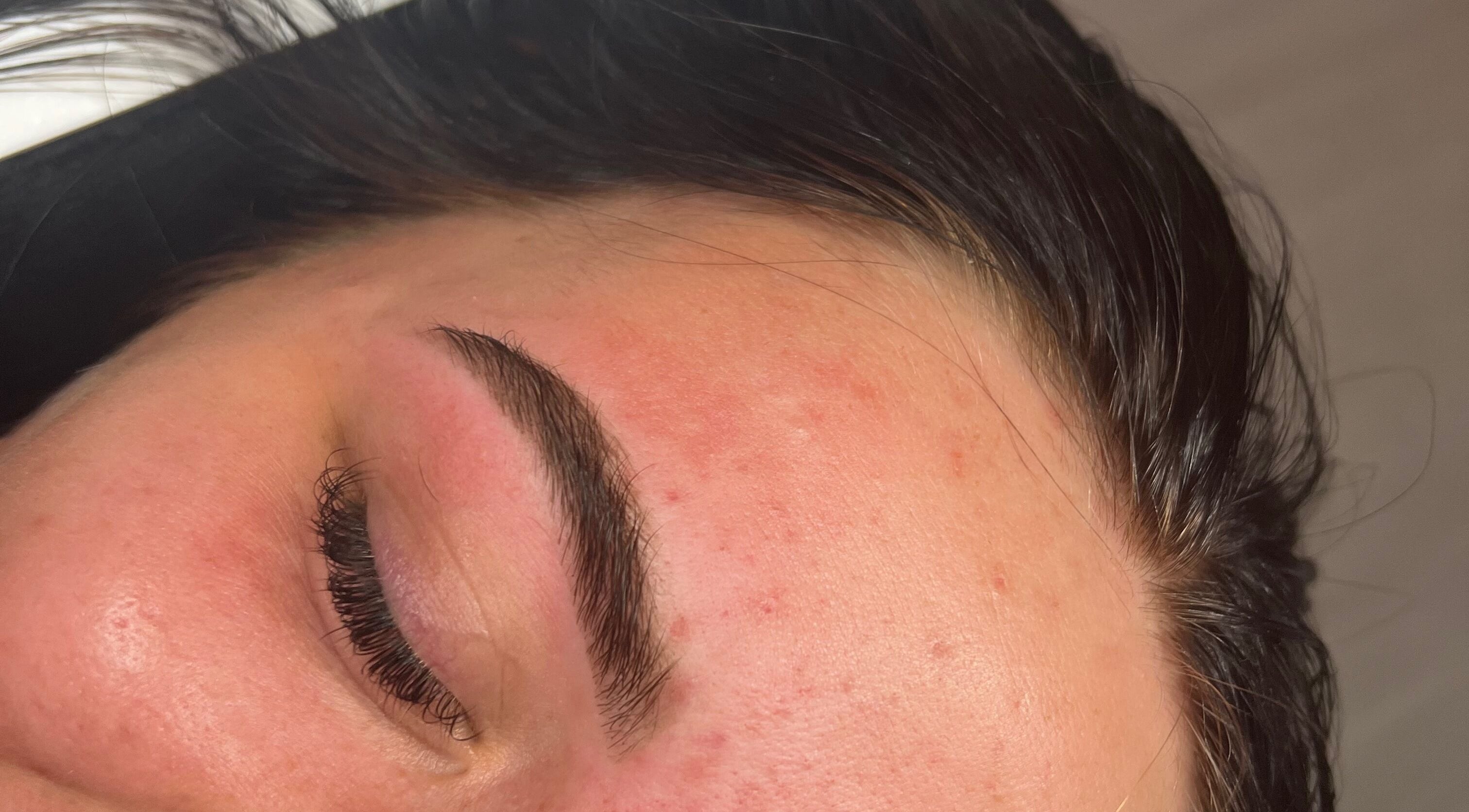 Close-up of perfectly shaped eyebrow at Molly Eliza Beauty, Rushden, England, GB.