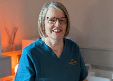 Professional therapist at Serenity Therapies, Killyhevlin, Northern Ireland, GB, smiling warmly.