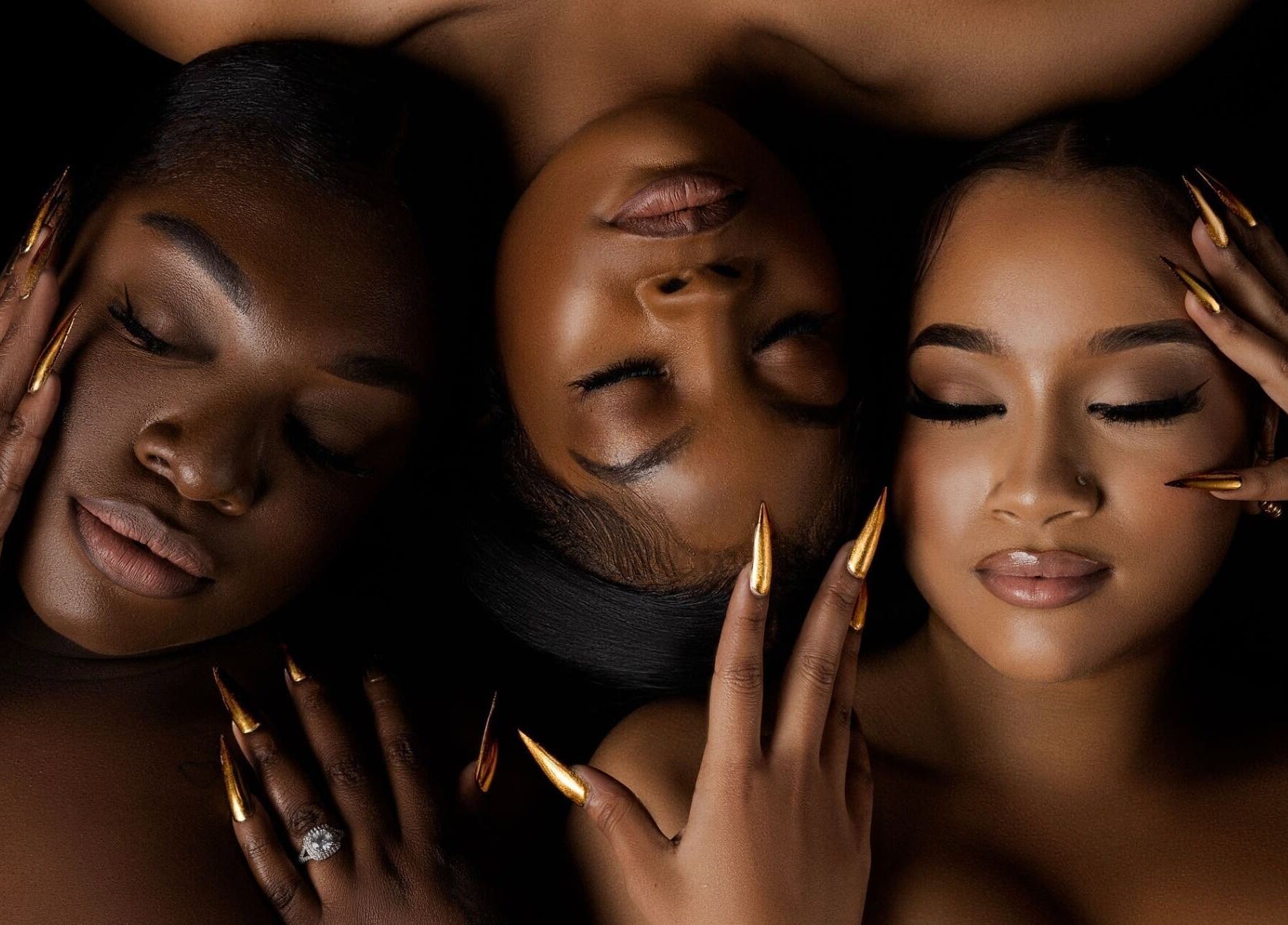 Relaxed women with gold nails enjoying beauty session at Babe Cave Beauty, Atlanta, Georgia, US.