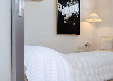 Luxurious treatment room at Indulge Body and Beauty in Moama, New South Wales, AU, with elegant decor.
