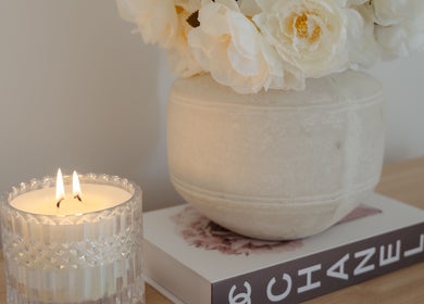 Peaceful candle and vase setup at Indulge Body and Beauty, Moama, New South Wales, AU.