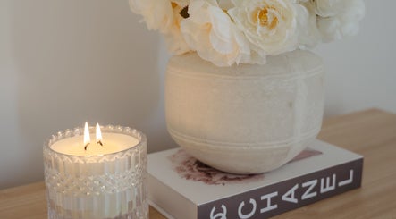 Peaceful candle and vase setup at Indulge Body and Beauty, Moama, New South Wales, AU.