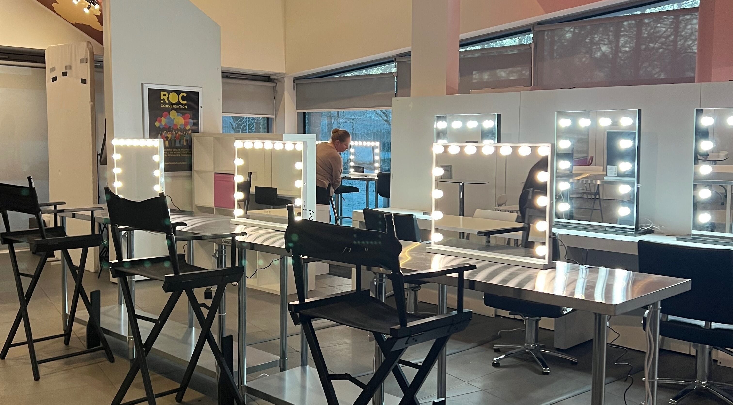 Bright makeup stations at Global Make Up Hair and Productions Academy Ltd, Partington, England, GB.