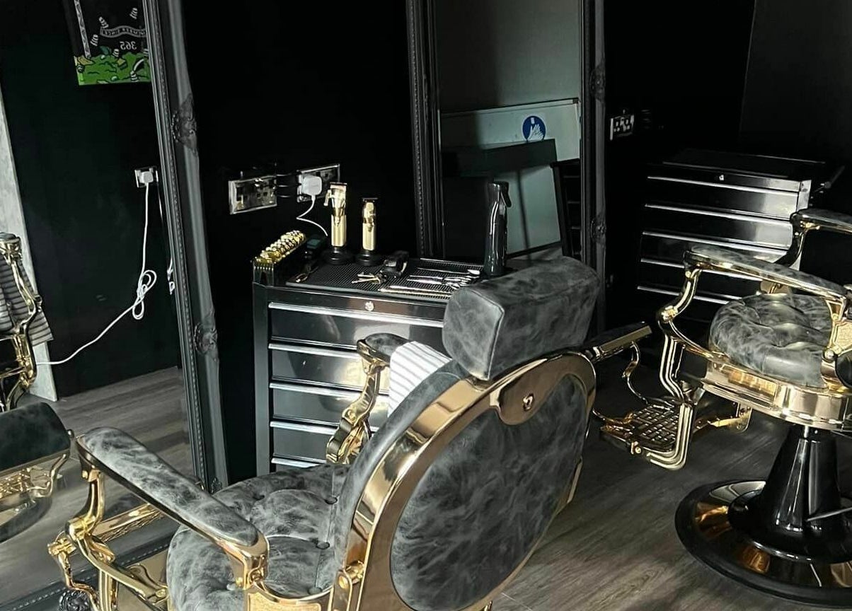 Opulent barber chairs at Grade A Barbers (Inverurie), Inverurie, Scotland, GB, showcasing sleek, stylish design.