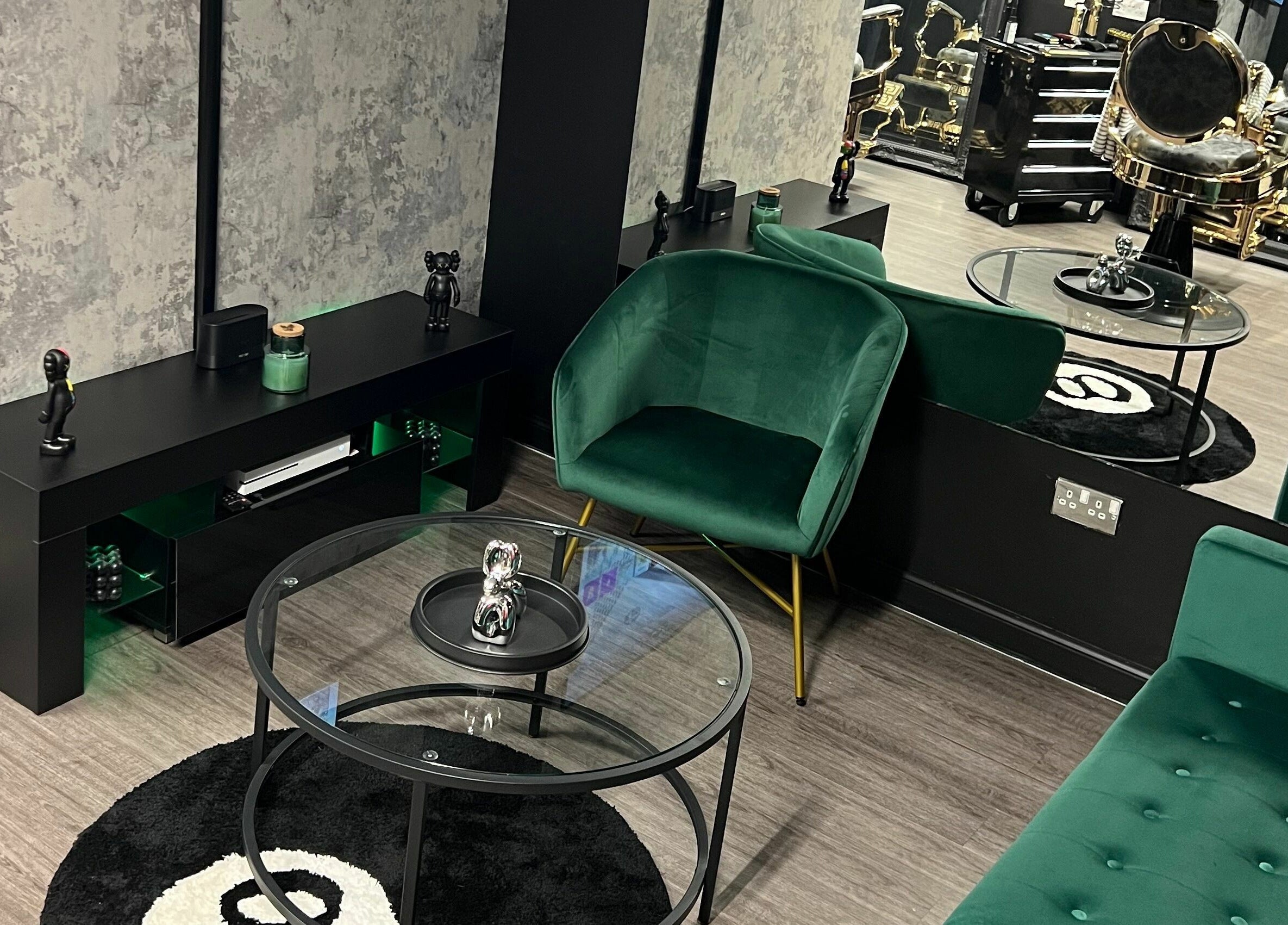 Modern waiting area at Grade A Barbers (Inverurie) with green seating, Inverurie, Scotland, GB.