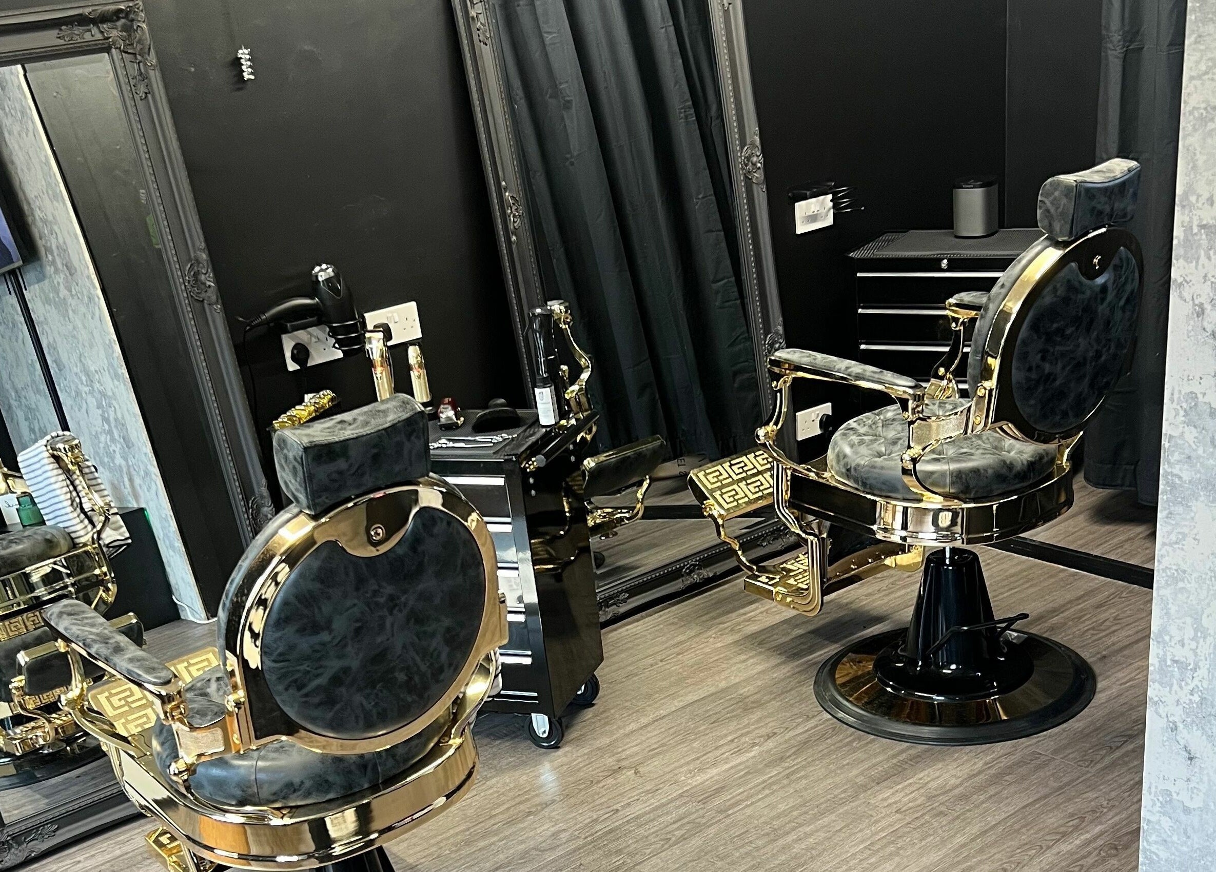 Elegant interior of Grade A Barbers in Inverurie, Scotland, GB with plush chairs and stylish decor.
