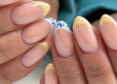 Elegant nail art with yellow tips at Beauty by Em, Clowne, England, GB.
