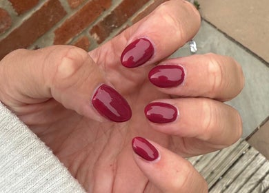 Close-up of elegant crimson manicure from Beauty by Em, Clowne, England, GB.
