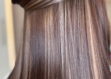 Shiny, straightened hair at Alice Olivia Hair Designer, Portsmouth, England, GB.