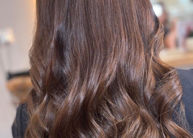Glossy wavy hair styled at Alice Olivia Hair Designer, Portsmouth, England, GB salon.