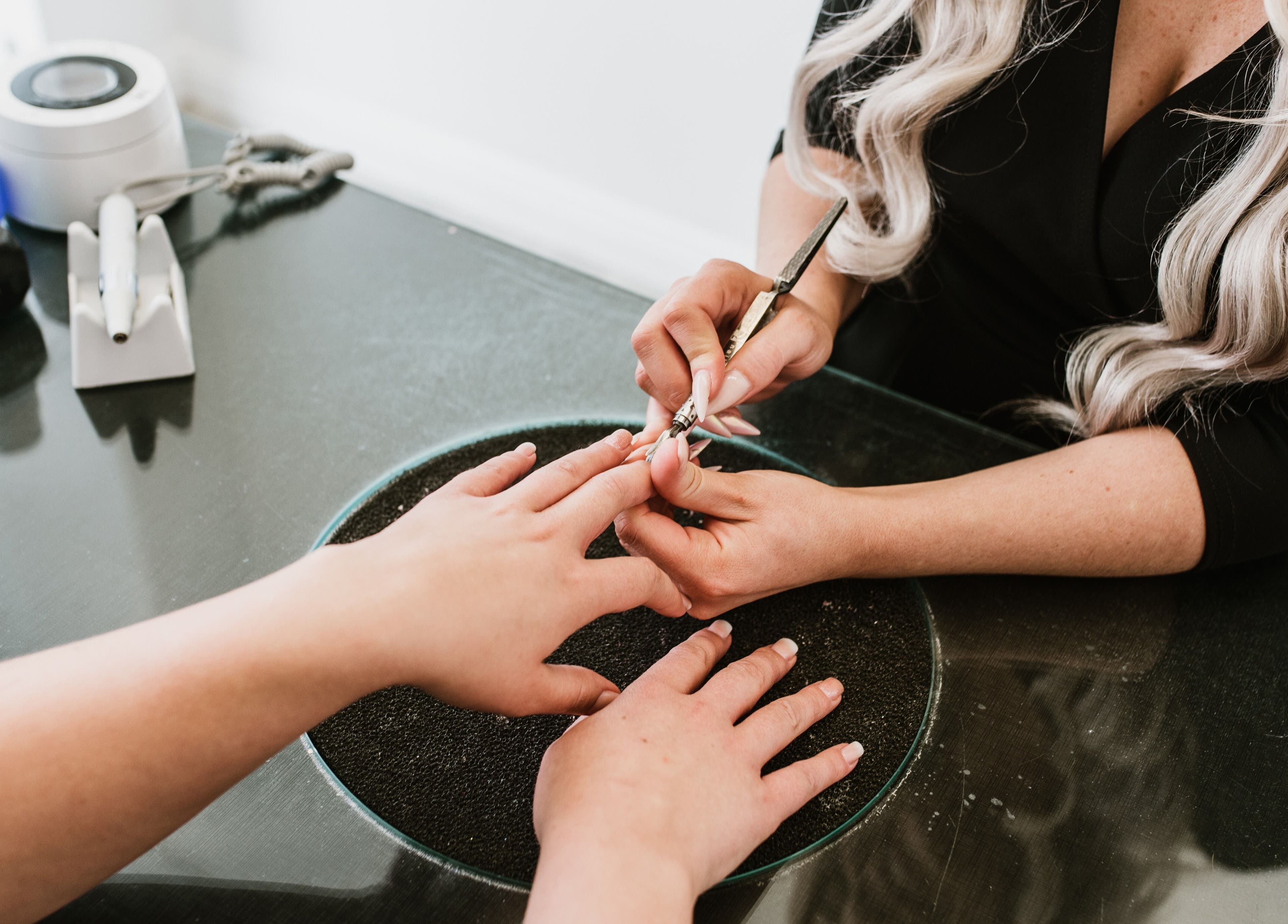 Manicure service at Goddess Glow Tamworth, New South Wales, AU showcasing detailed nail care.
