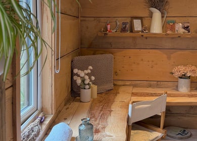Cozy natural wood interior at Cedar Cabin Therapies, Holmfirth, England, GB, featuring calm decor.