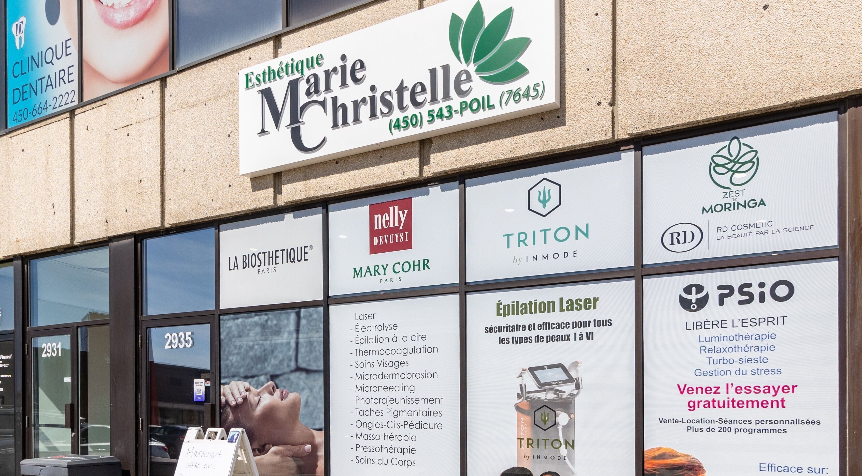 Entrée d'Esthétique Marie-Christelle à Laval, Québec, CA, affichant divers services de beauté.