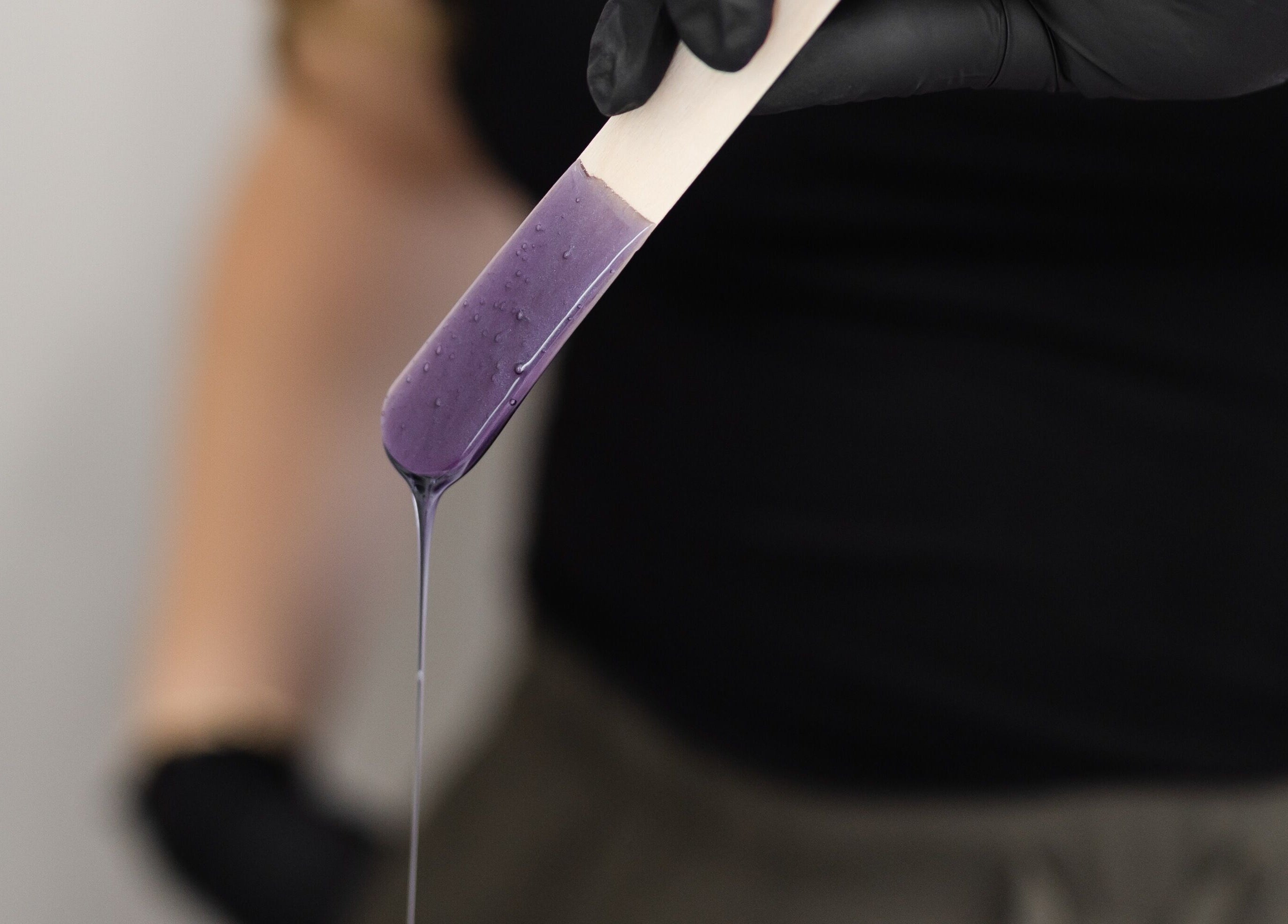 Close-up of violet wax on stick at The Babe Cave, Hanover, Ontario, CA.