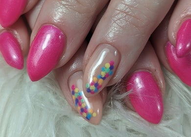 Vibrant pink and polka dot manicure at DC Beauty in Samantha Louise Beauty Studio, Coleraine, Northern Ireland, GB.