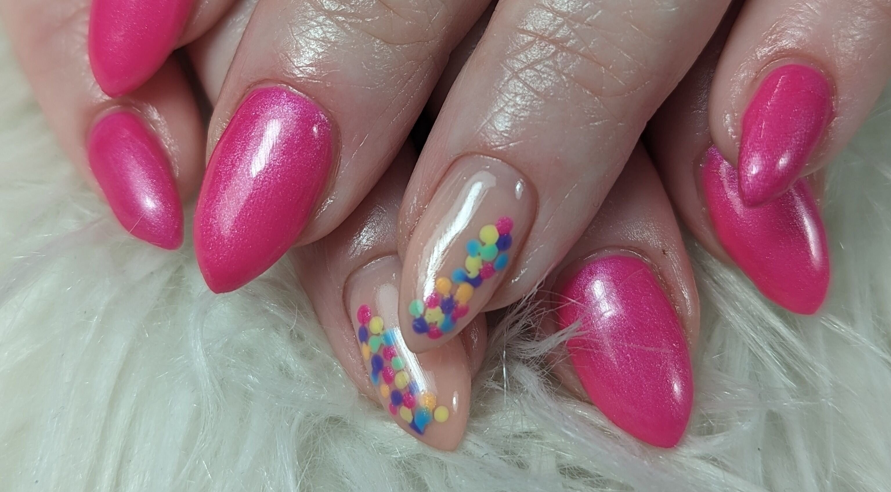 Bright pink nails with colorful accents at DC Beauty, Samantha Louise Beauty Studio, Coleraine, Northern Ireland, GB.