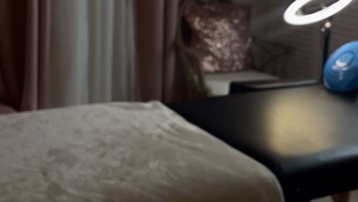 Cozy massage table at Winx by Savs, Westmoreland, Saint James, BB with soft lighting.