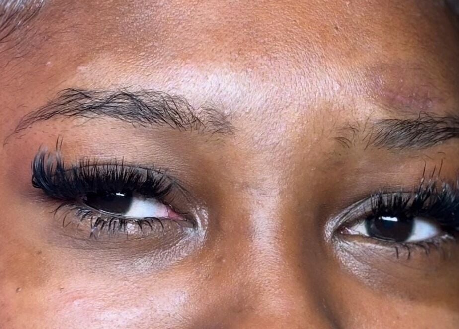 Close-up of elegant lash extensions at Winx by Savs in Westmoreland, Saint James, BB.