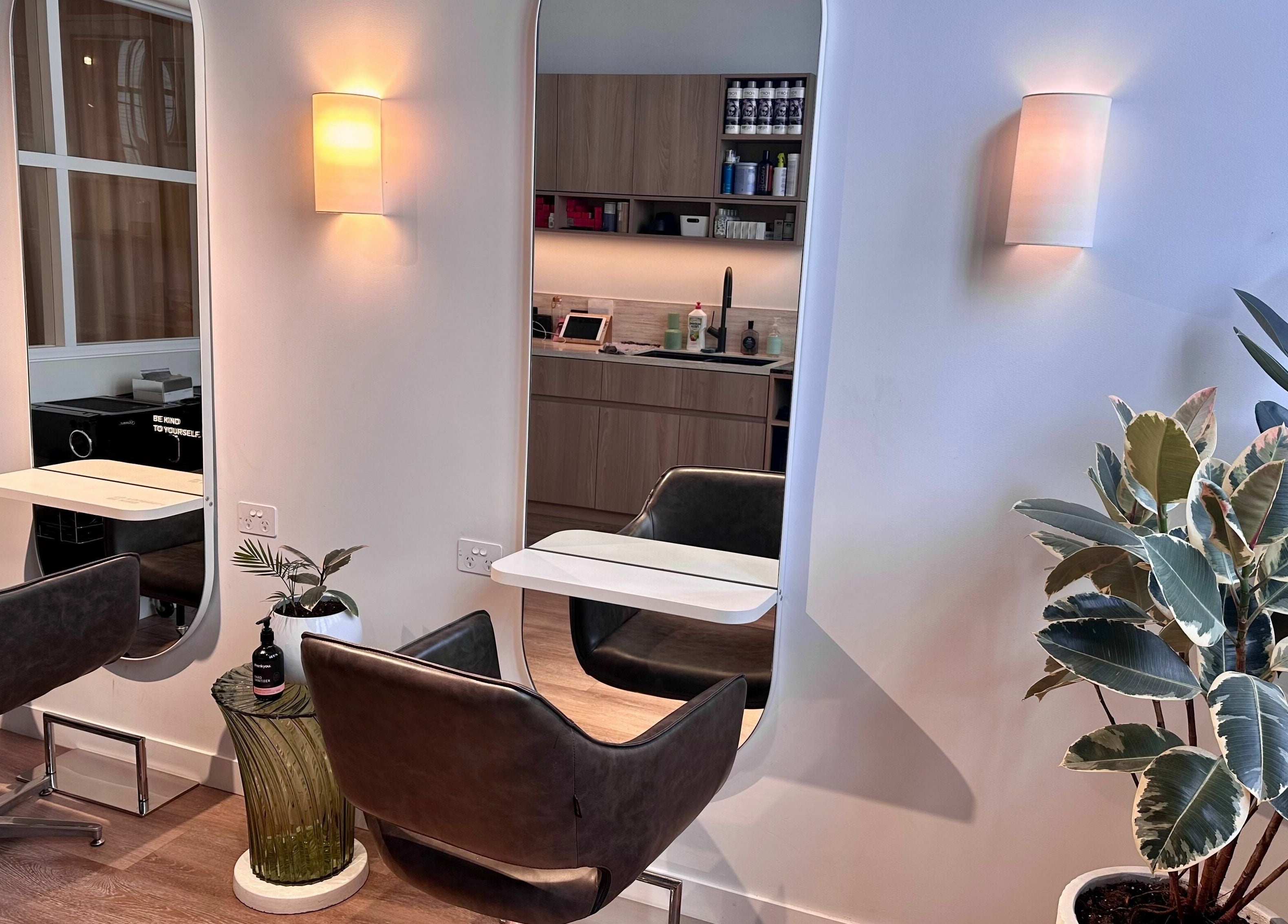 Elegant salon interior at Stuart Bane Colour, Surry Hills, New South Wales, AU, featuring stylish seating and decor.