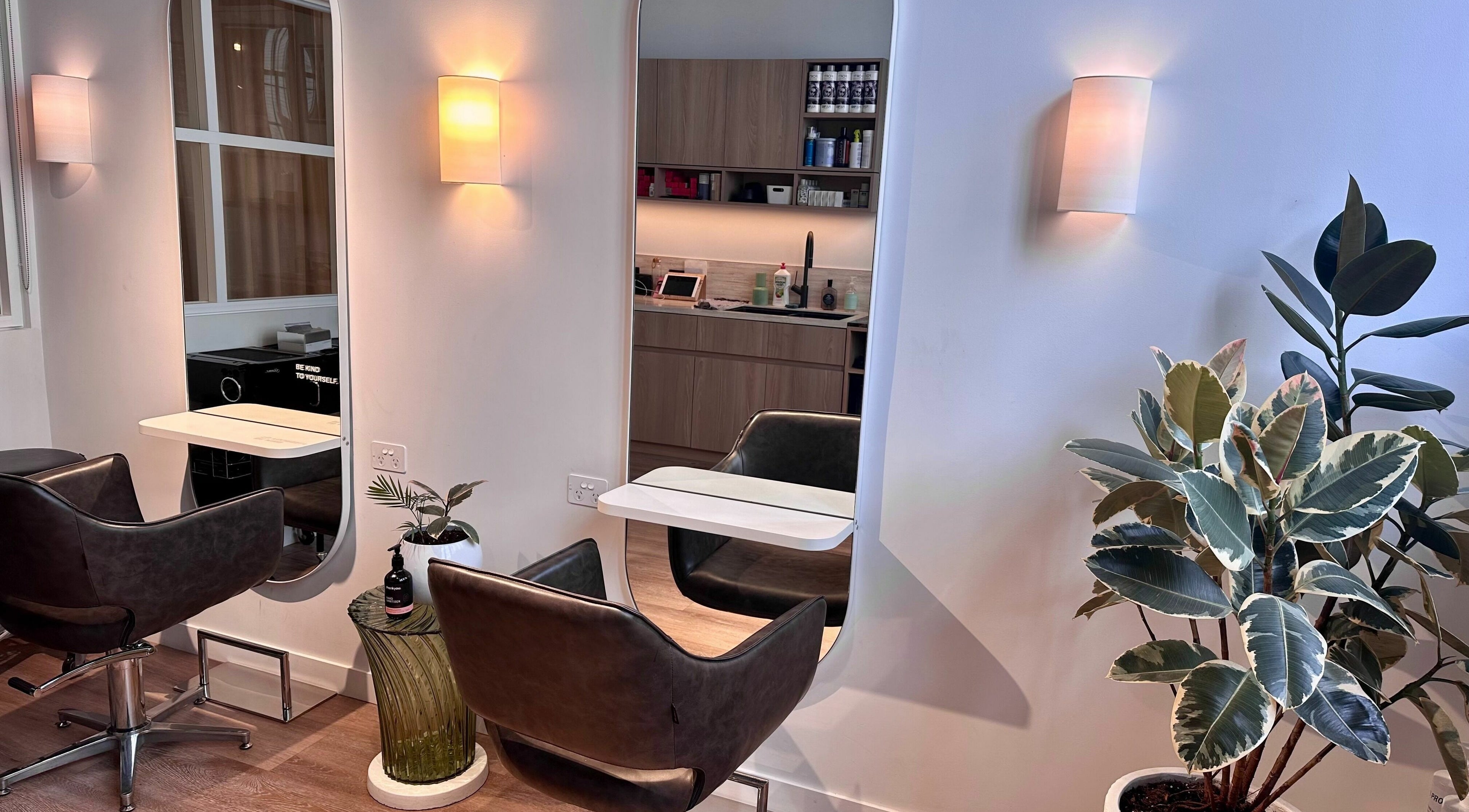 Elegant salon interior at Stuart Bane Colour, Surry Hills, New South Wales, AU, featuring stylish seating and decor.