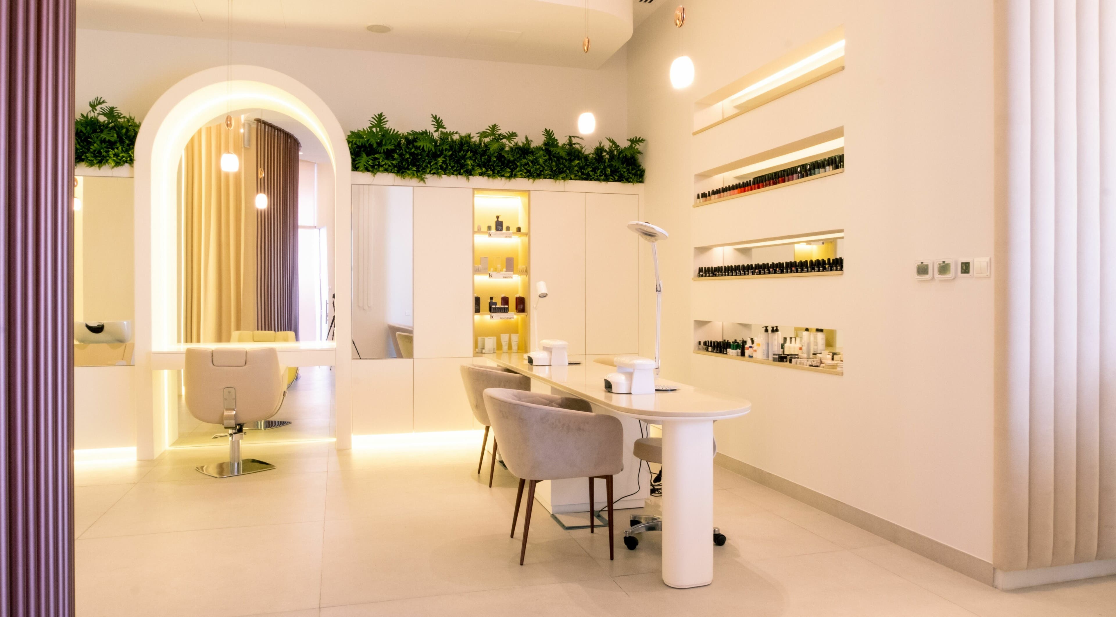Chic interior of Vernie Beauty Salon in Dubai, Dubai, AE showcasing modern styling stations and elegant decor.