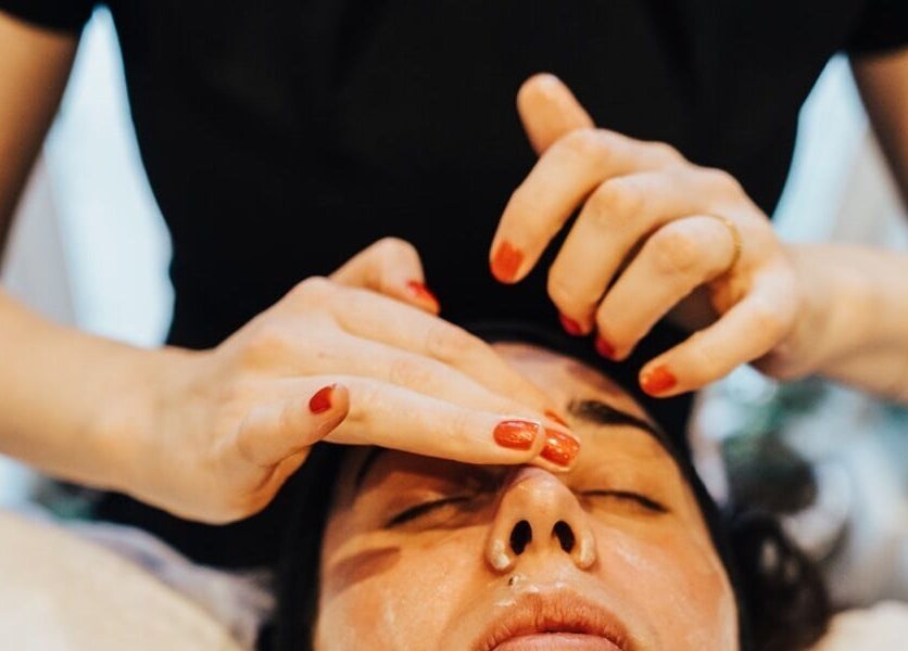 Facial treatment at Chloe Proud, Berkhamsted, England, GB showcasing expert massage techniques.