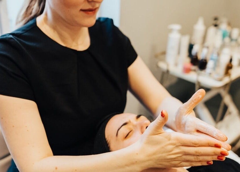 Facial massage at Chloe Proud in Berkhamsted, England, GB. A calming and serene wellness experience.